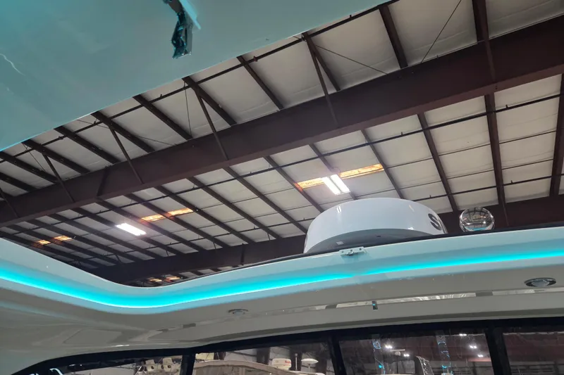 Slide: The Image of 2023 Sea Ray SLX 350 interior roof view with sleek design and modern features. - 53