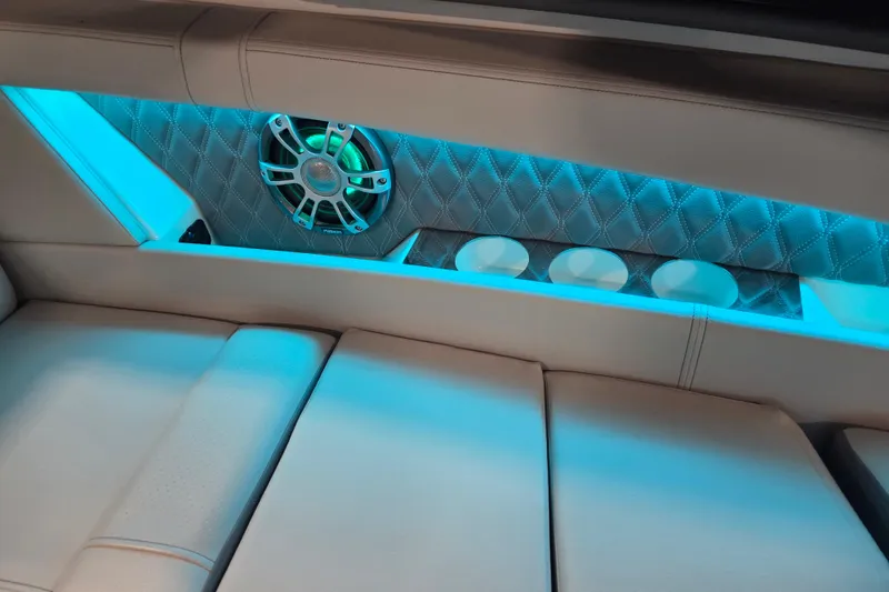 Slide: The Image of 2023 Sea Ray SLX 350 boat dashboard with control panel and sleek design. - 57