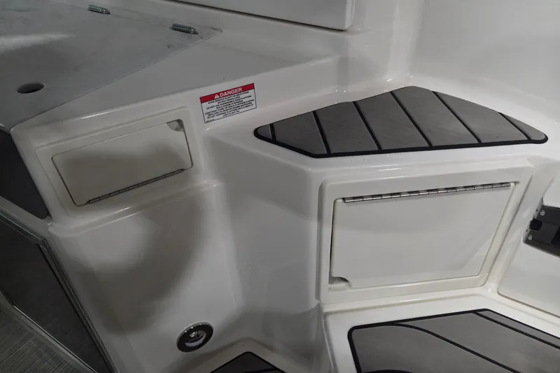 Slide: The Image of 2023 Sea Ray SLX 350 boat dashboard with control panel and sleek design. - 72