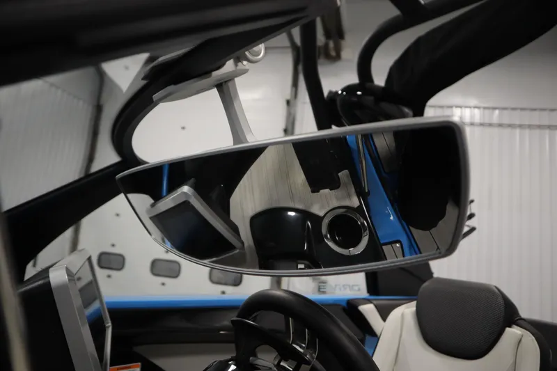 Slide: The Image of 2023 Yamaha Boats 222XD interior mirror and dashboard view. - 21