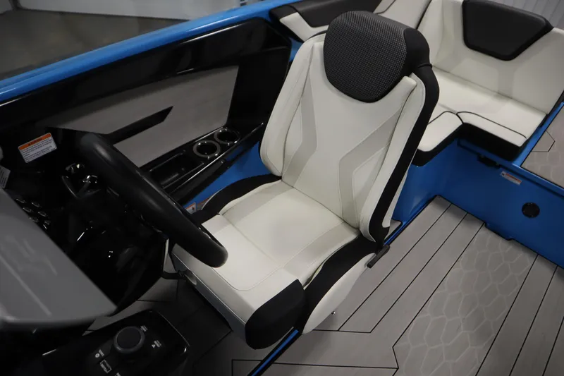 Slide: The Image of 2023 Yamaha Boats 222XD interior with sleek seating and modern dashboard design. - 27