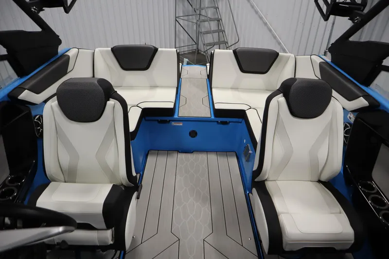 Slide: The Image of 2023 Yamaha Boats 222XD interior with white and black seating, modern design. - 37