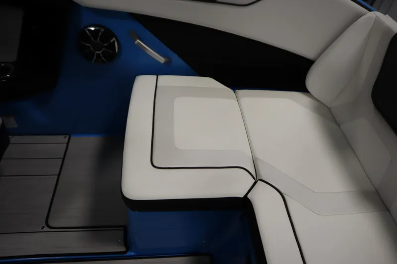 Slide: The Image of 2023 Yamaha Boats 222XD interior seating with white upholstery and sleek design. - 41