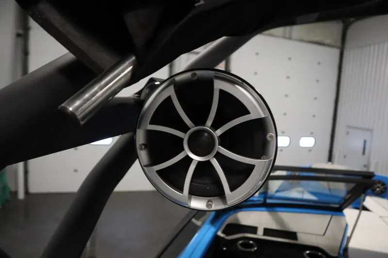 Slide: The Image of 2023 Yamaha Boats 222XD speaker detail in a modern boat interior setting. - 43