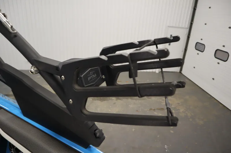 Slide: The Image of 2023 Yamaha Boats 222XD wakeboard rack in a garage setting. - 45