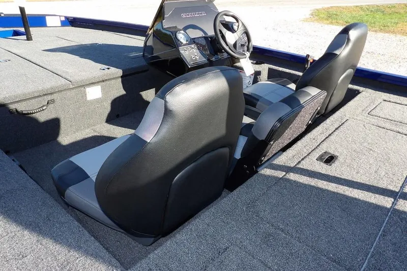 Slide: The Image of 2026 Crestliner XF 189 boat interior with dual seats and steering console. - 10