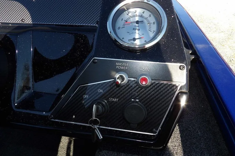 Slide: The Image of Dashboard of 2026 Crestliner XF 189 boat with RPM gauge and controls. - 21