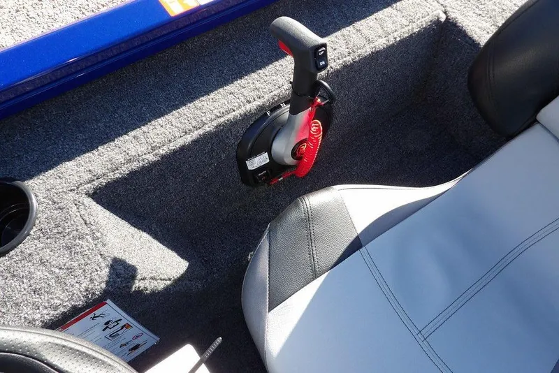 Slide: The Image of Interior of 2026 Crestliner XF 189 boat showing throttle control and seating. - 24