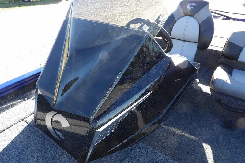 Slide: The Image of 2026 Crestliner XF 189 boat console with sleek design and comfortable seating. - 25