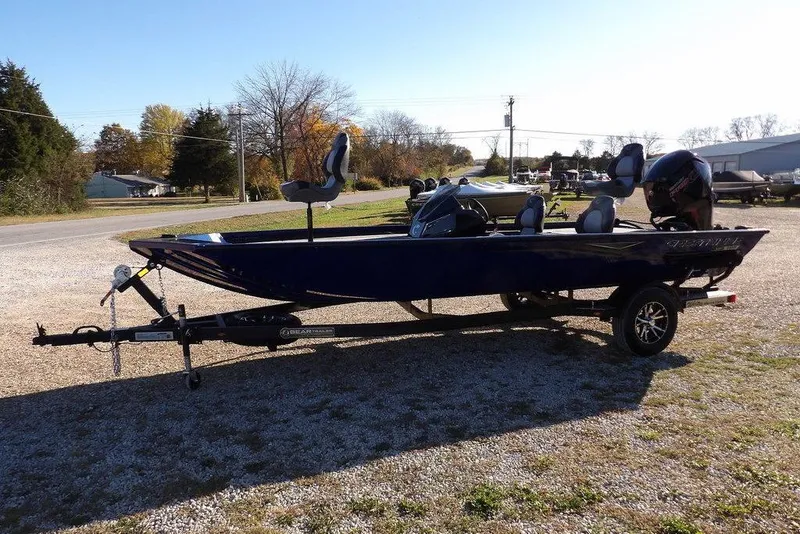 Slide: The Image of 2026 Crestliner XF 189 boat on trailer, parked outdoors on gravel. - 3