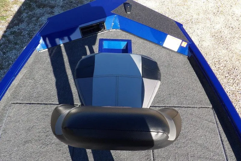 Slide: The Image of 2026 Crestliner XF 189 boat interior with gray and black seating, blue accents. - 34