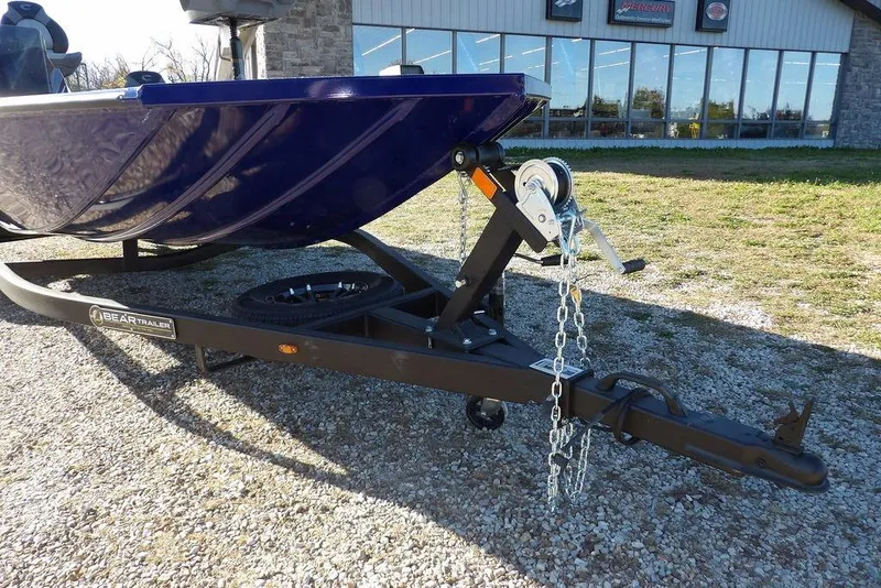 Slide: The Image of 2026 Crestliner XF 189 boat on Bear trailer, parked outdoors. - 39