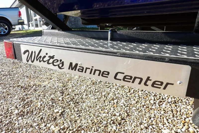 Slide: The Image of 2026 Crestliner XF 189 trailer at White's Marine Center, gravel lot background. - 45