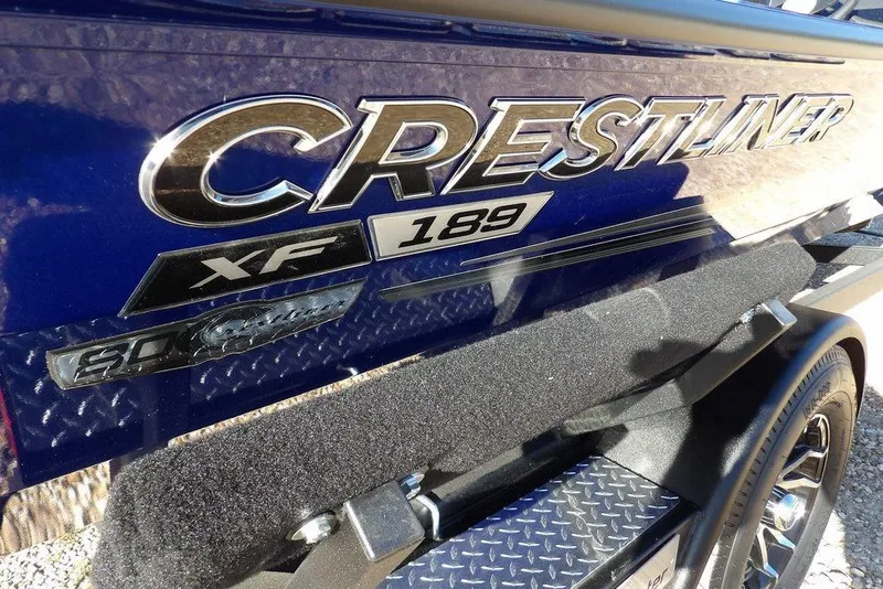 Slide: The Image of 2026 Crestliner XF 189 boat, close-up of logo and model details. - 46