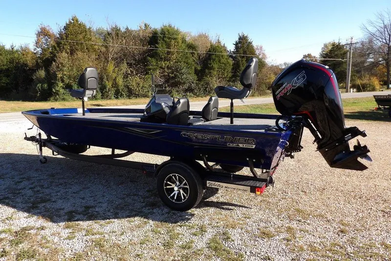 Slide: The Image of 2026 Crestliner XF 189 boat on trailer, featuring sleek design and powerful outboard motor. - 5