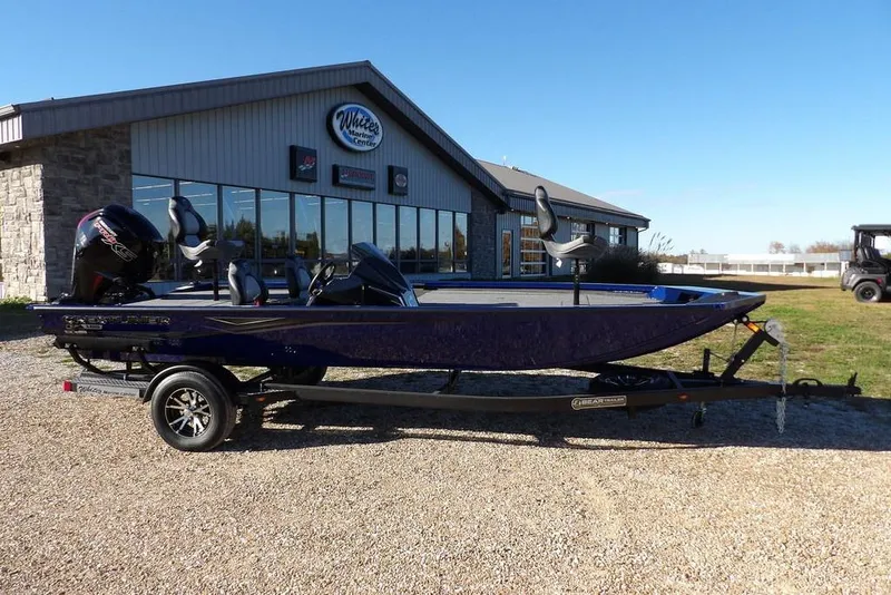 Slide: The Image of 2026 Crestliner XF 189 boat on trailer outside dealership, sunny day. - 6