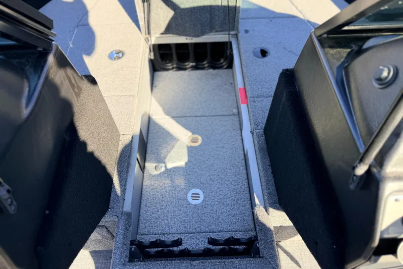 Slide: The Image of 2024 Alumacraft Competitor 175X Sport interior storage compartment, showcasing spacious design and functionality. - 26