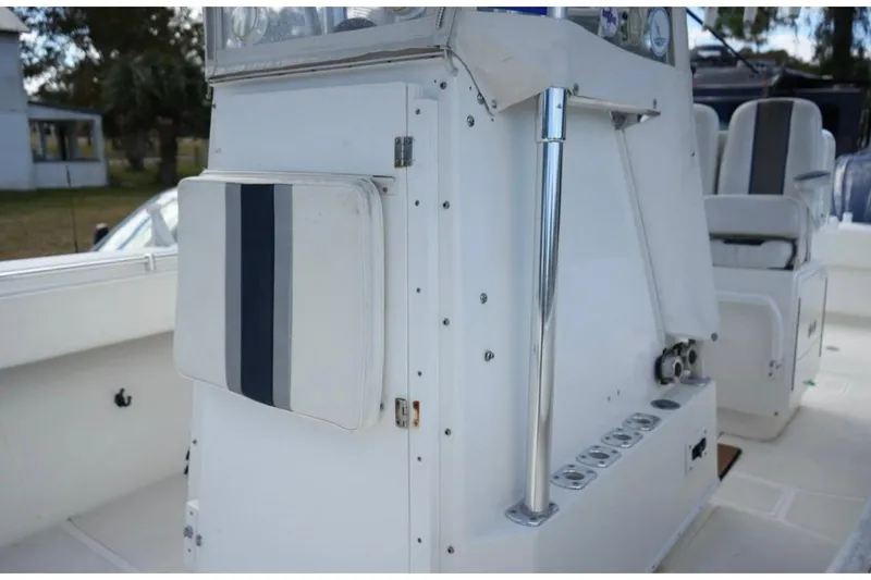 Slide: The Image of 2000 Contender 36 Open boat interior with seating and console details. - 19