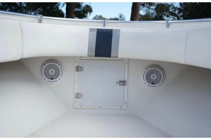 Slide: The Image of 2000 Contender 36 Open boat interior with speakers and storage compartment. - 23