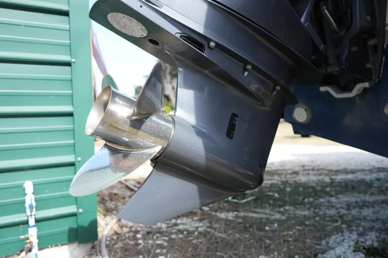 Slide: The Image of Close-up of a 2000 Contender 36 Open boat propeller and motor. - 6