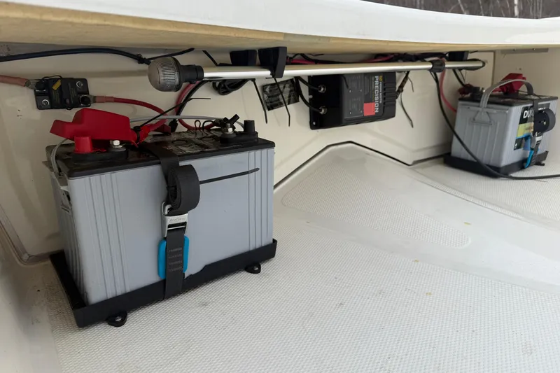 Slide: The Image of 2016 Mako Pro Skiff 17 CC boat battery setup with wiring and charger. - 31