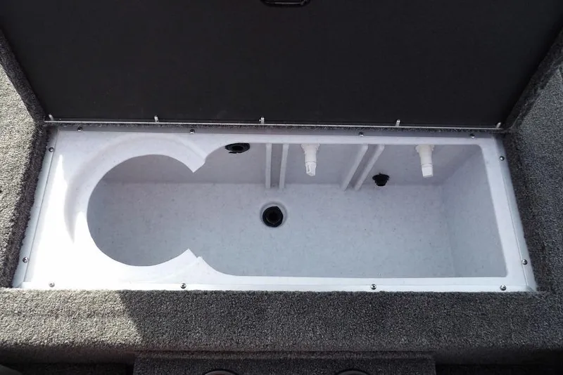 Slide: The Image of Open storage compartment in 2026 Crestliner XF 189 boat, featuring a spacious interior. - 10