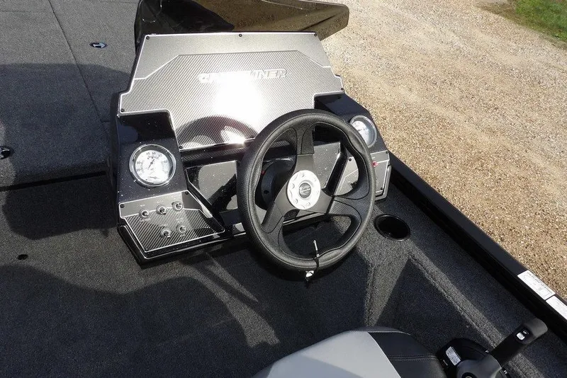 Slide: The Image of 2026 Crestliner XF 189 boat dashboard with steering wheel and gauges. - 17