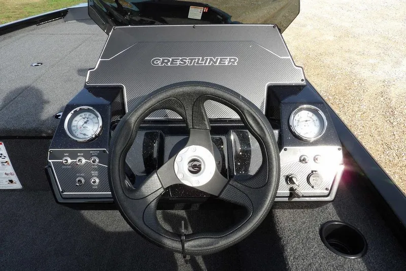 Slide: The Image of Dashboard of 2026 Crestliner XF 189 boat with steering wheel and gauges. - 22