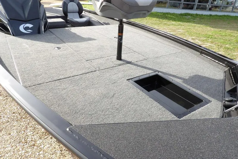 Slide: The Image of 2026 Crestliner XF 189 boat deck with storage compartment and seating. - 30