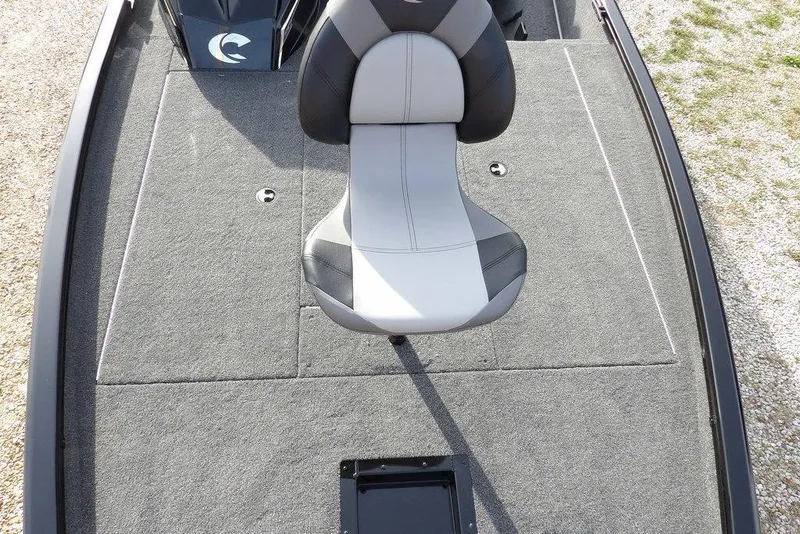 Slide: The Image of 2026 Crestliner XF 189 boat interior with gray carpet and a central seat. - 32