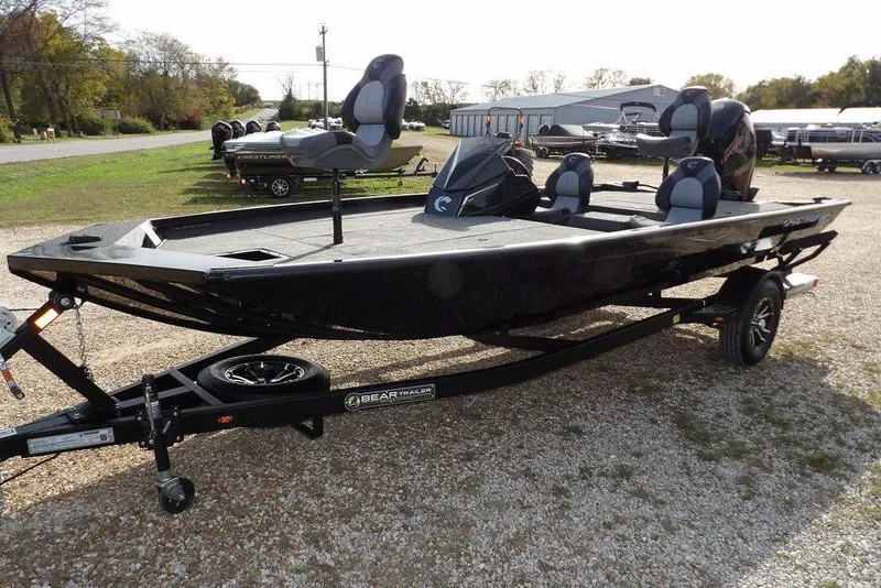 Slide: The Image of 2026 Crestliner XF 189 fishing boat on trailer, parked outdoors. - 4