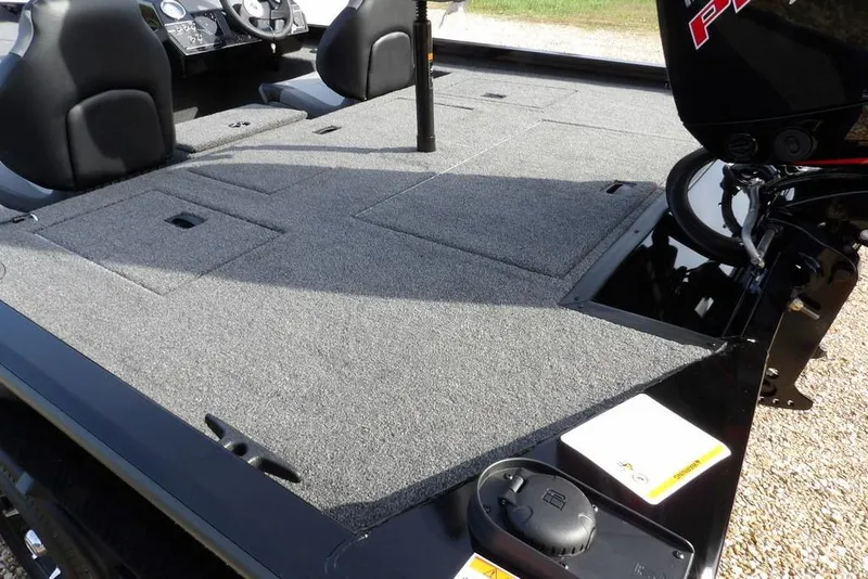 Slide: The Image of 2026 Crestliner XF 189 boat interior with carpeted deck and seating. - 6