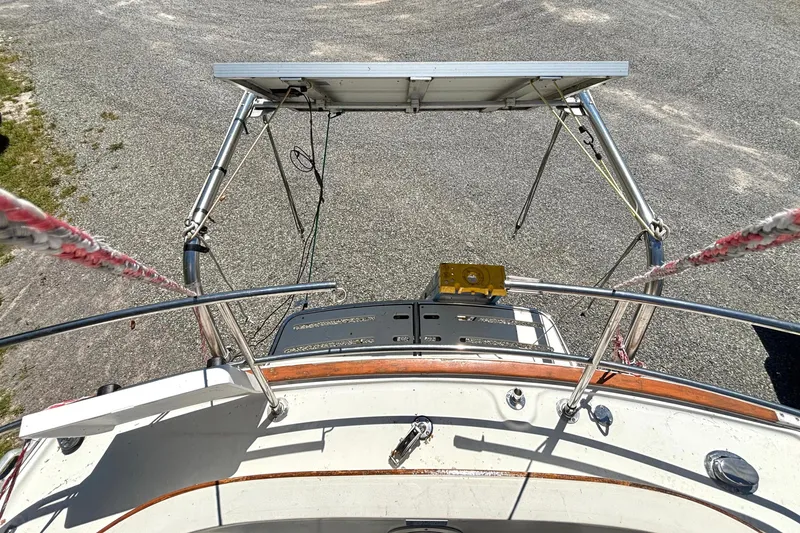 Slide: The Image of 1985 Nonsuch 30 Ultra sailboat with solar panel and deck view. - 15