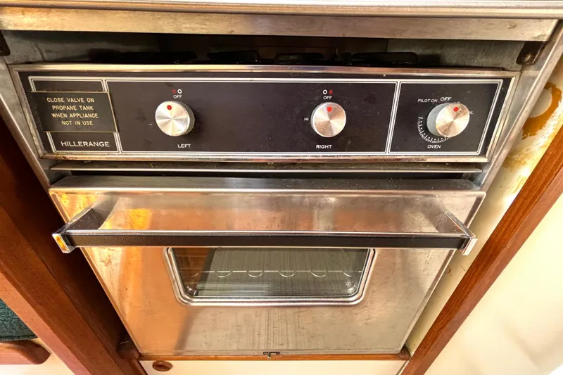 Slide: The Image of Hillerange stove and oven in a 1985 Nonsuch 30 Ulta sailboat galley. - 37