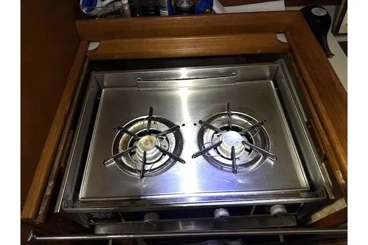 Slide: The Image of Stainless steel two-burner stove on 1985 Nonsuch 30 Ulta sailboat. - 8