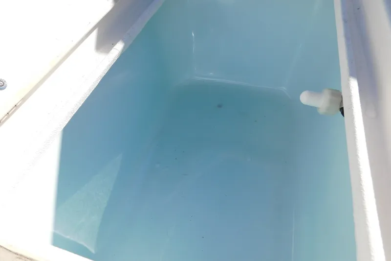 Slide: The Image of Interior view of a 2019 Key West 1720 Center Console boat compartment. - 24