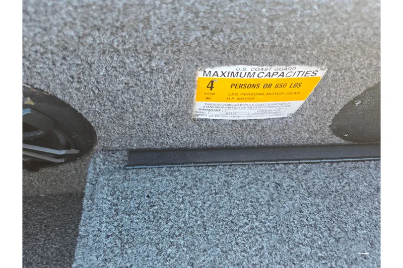Slide: The Image of 2021 Lowe Stinger 175C boat capacity label, maximum 4 persons or 650 lbs. - 13