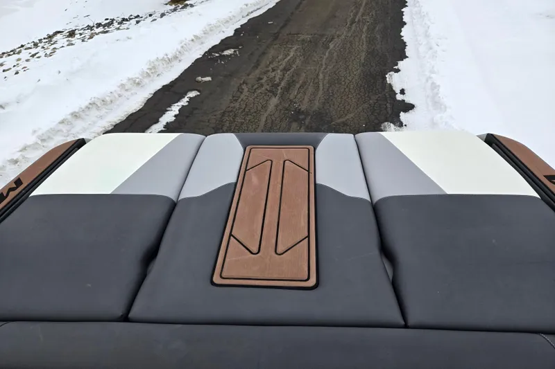 Slide: The Image of 2021 Moomba Max boat interior with snow-covered road in background. - 26