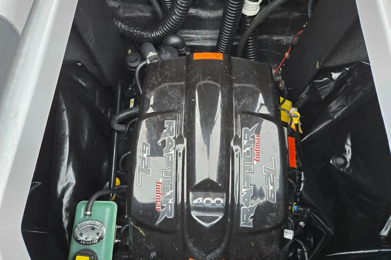 Slide: The Image of 2021 Moomba Max engine compartment featuring a powerful Raptor 6.2L Indmar engine. - 28