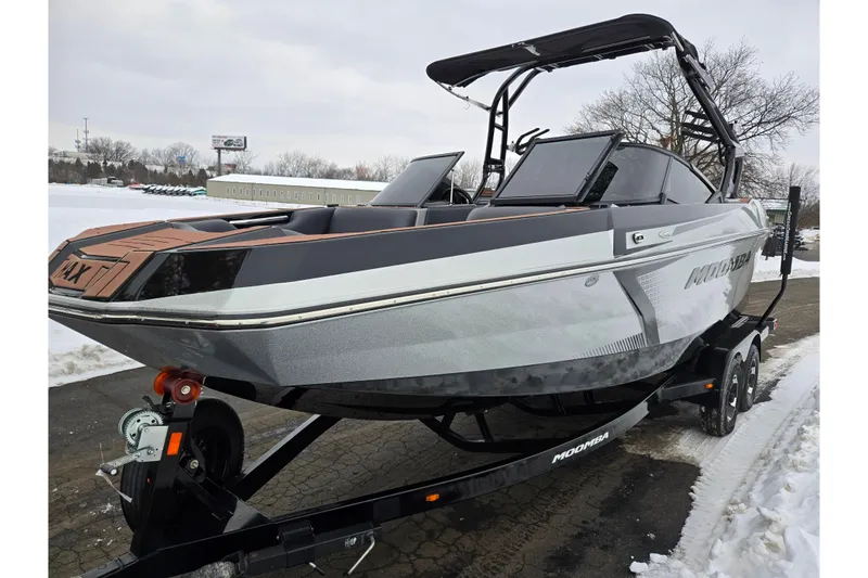 Slide: The Image of 2021 Moomba Max boat on trailer in snowy outdoor setting. - 8