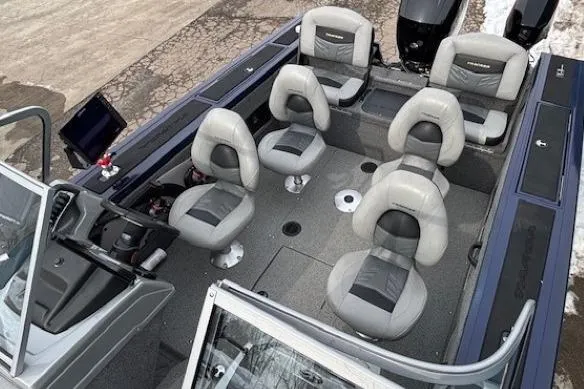 Slide: The Image of 2019 Tracker Targa V-18 Combo boat interior with six seats and modern dashboard. - 15