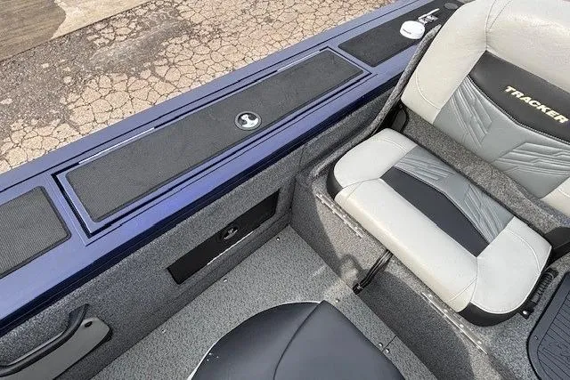 Slide: The Image of 2019 Tracker Targa V-18 Combo boat interior with seating and storage compartments. - 26