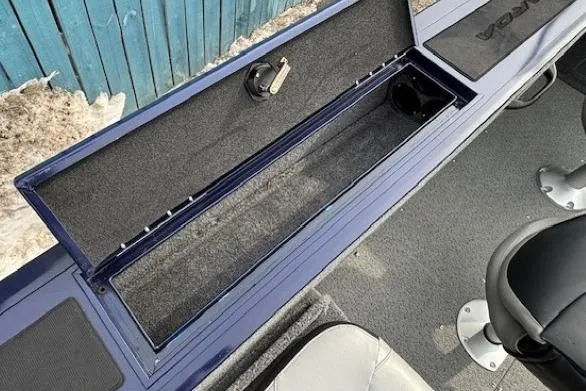 Slide: The Image of 2019 Tracker Targa V-18 Combo boat interior storage compartment with seating. - 27