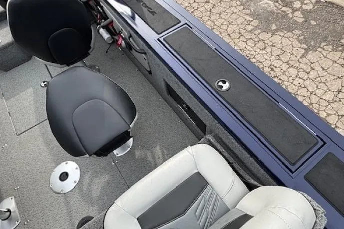 Slide: The Image of 2019 Tracker Targa V-18 Combo boat interior with seating and storage compartments. - 29