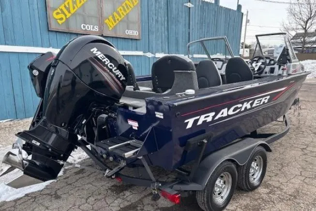 Slide: The Image of 2019 Tracker Targa V-18 Combo boat with Mercury engine on trailer. - 3