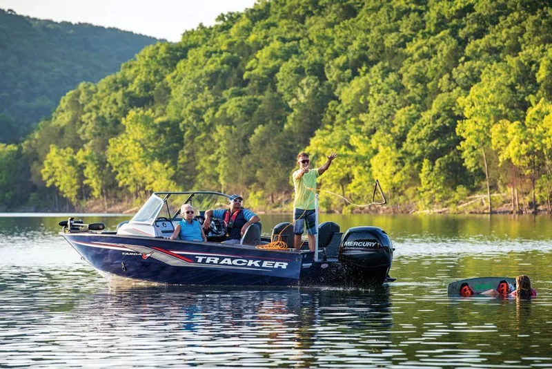 Slide: The Image of 2019 Tracker Targa V-18 Combo boat with cover on trailer, parked outdoors. - 41