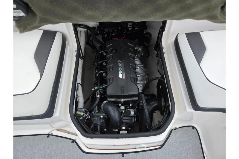 Slide: The Image of Engine compartment of 2023 Yamaha Boats AR195, showcasing sleek design and advanced mechanics. - 22