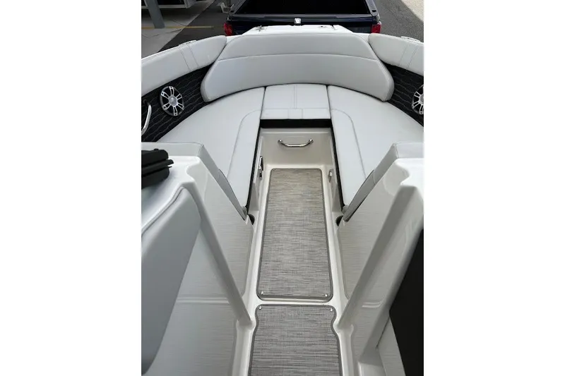 Slide: The Image of 2023 Sea Ray SPX 230 boat interior with sleek seating and modern design. - 10