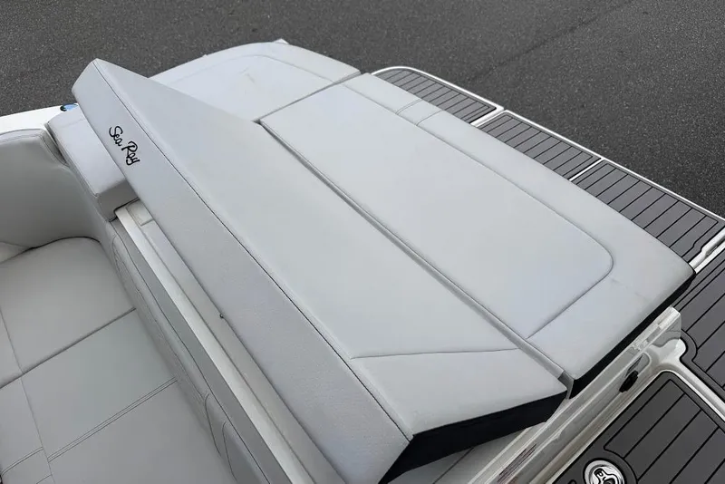 Slide: The Image of 2023 Sea Ray SPX 230 boat with sleek, modern seating and deck design. - 24
