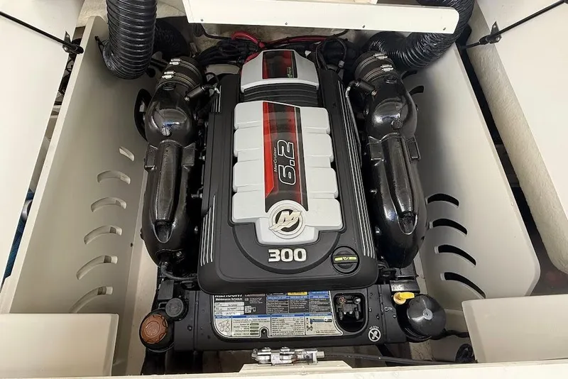 Slide: The Image of Engine compartment of 2023 Sea Ray SPX 230 boat, featuring a powerful 6.2L engine. - 31
